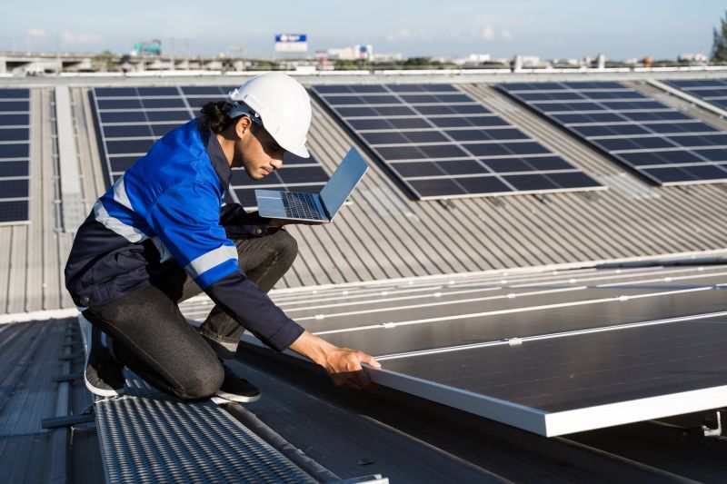 Technicians Installing Solar Panels